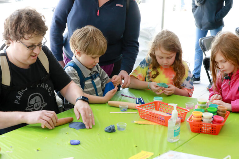 Kids playing with Play-Doh at a table